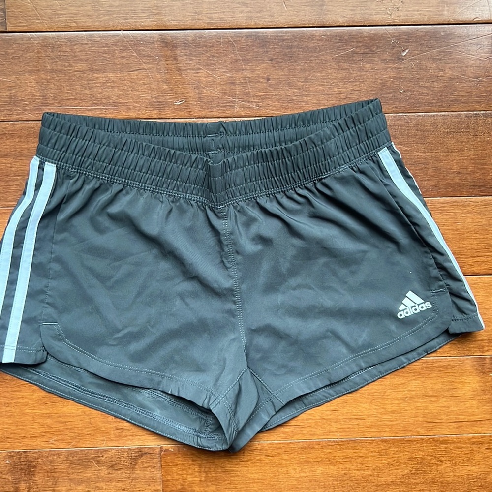 NWOT gray Adidas short running shorts. Size adult XS